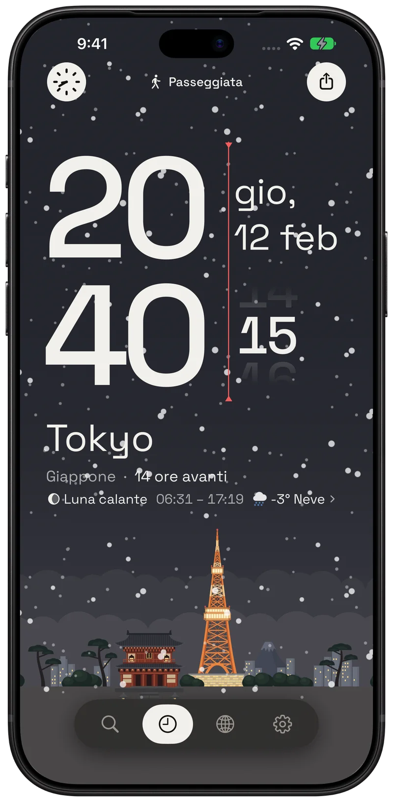 Tokyo alle 20:40, con neve che cade sopra la Torre di Tokyo.