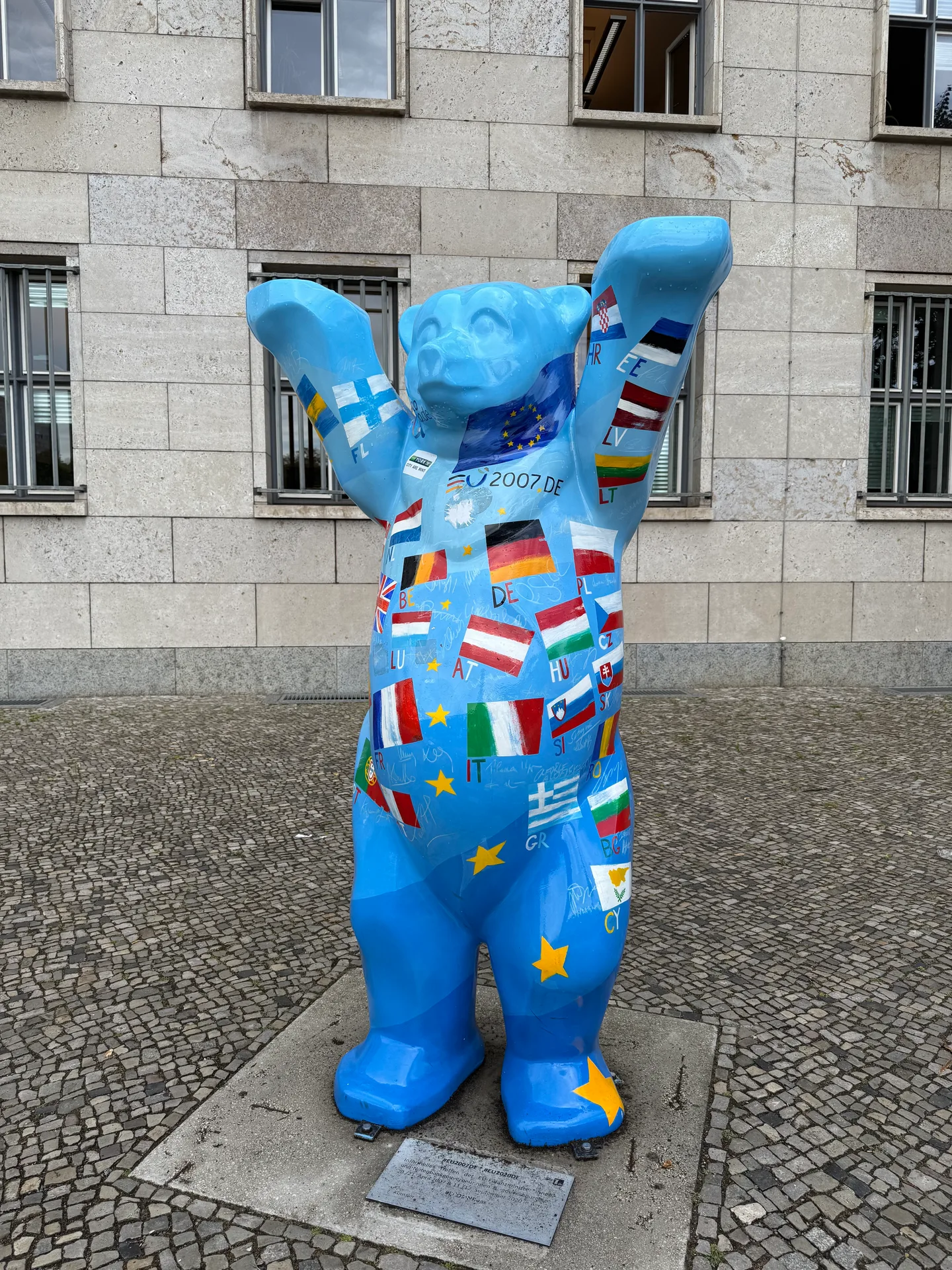 A blue Berlin bear and European flags